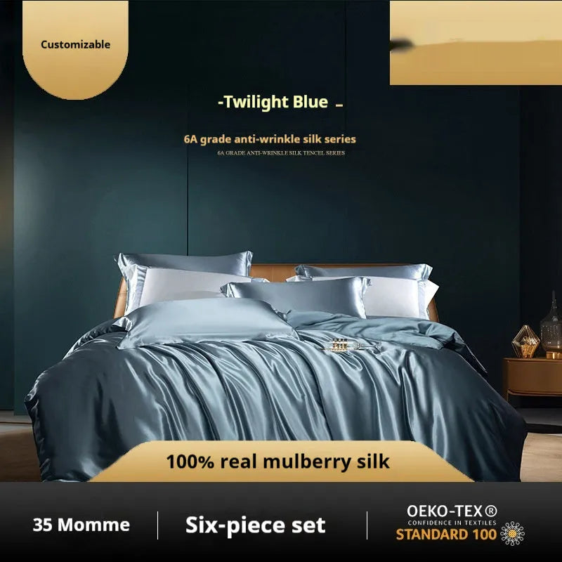 Solid colour silk four-piece quilt cover set shown in a light luxury bedroom setting.