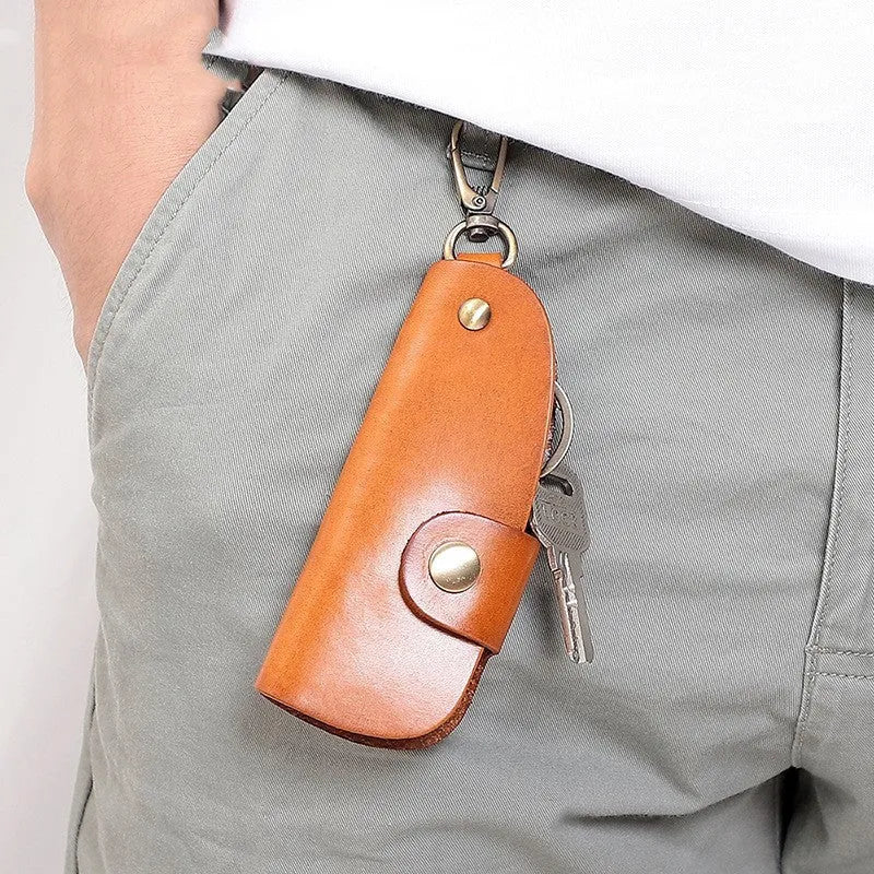 Handmade short strap leather key case for car keys in black, brown, coffee and purplish red colours.