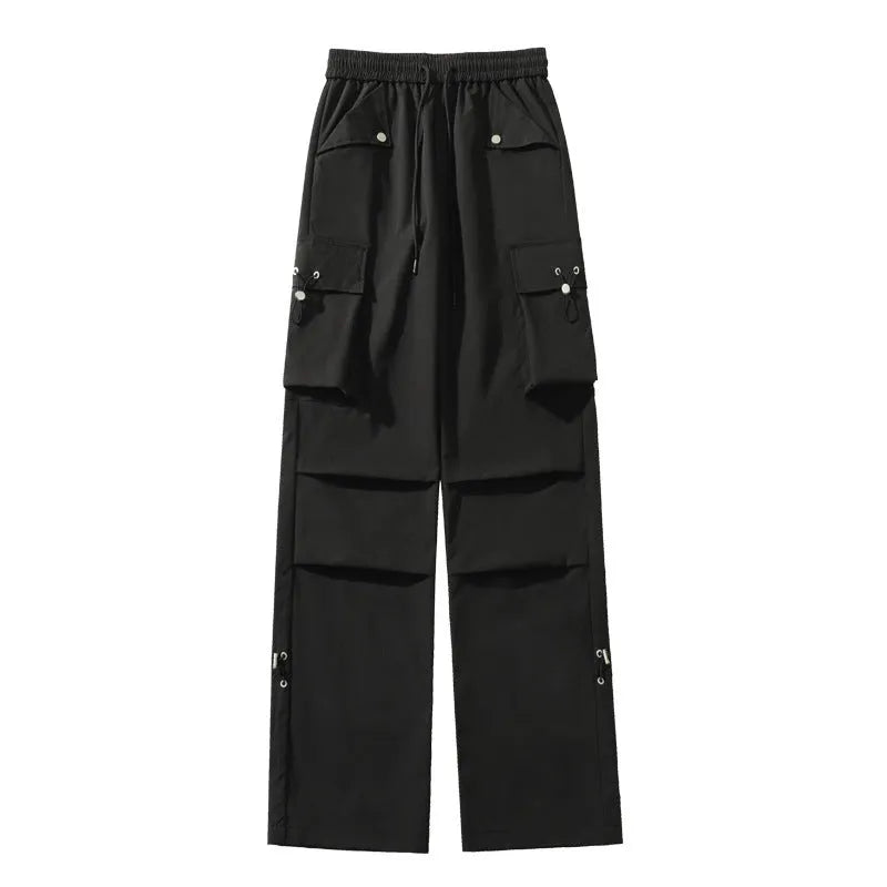 Plus size women's loose fit straight-leg waterproof trousers in black, grey, or white.