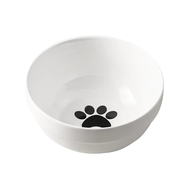 White ceramic cat bowl with cat paw design in black iron frame