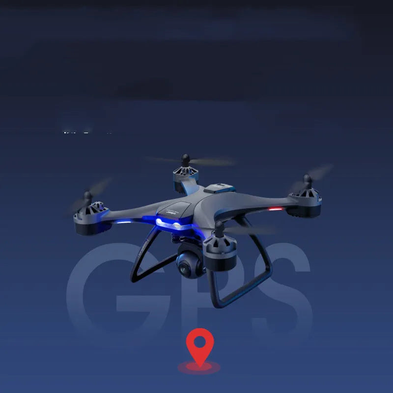 GPS remote control quadrocopter drone with camera on landing gear, next to its handle-style transmitter.
