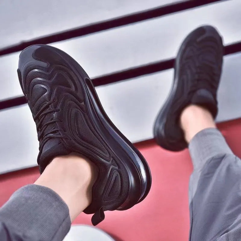 Men's black casual shoes with air cushion design, lace-up front, and thick sole for outdoor running