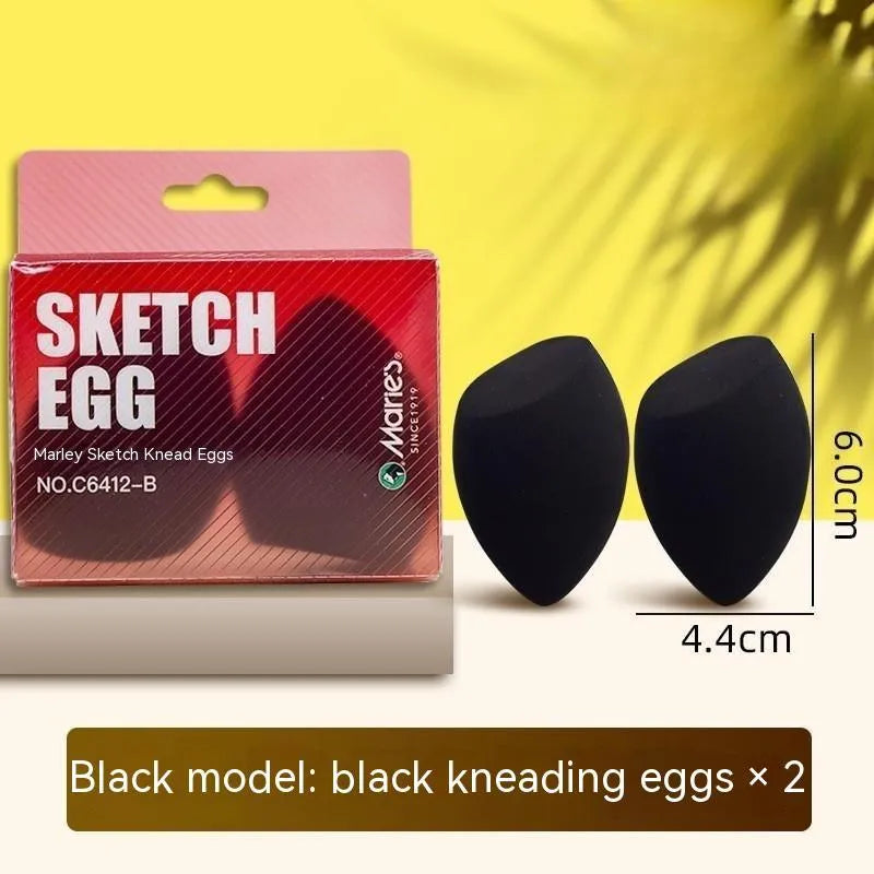 Yellow plastic rubbing knife for erasing fluorescent pen marks from sketches