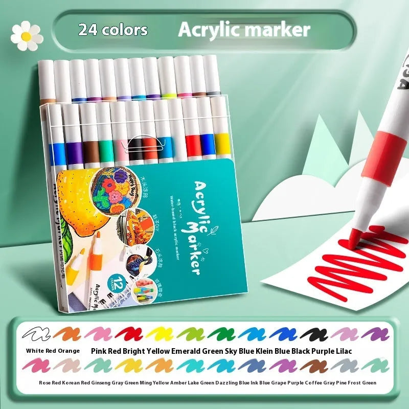 Box of multicoloured acrylic marker pens for student painting, showing plastic pen casings.