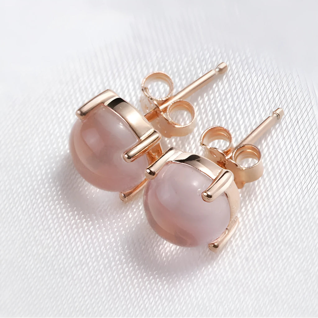 Women's rose gold drop shape stud earrings with synthetic ross quartz crystal inlay, Korean-style minimalist design