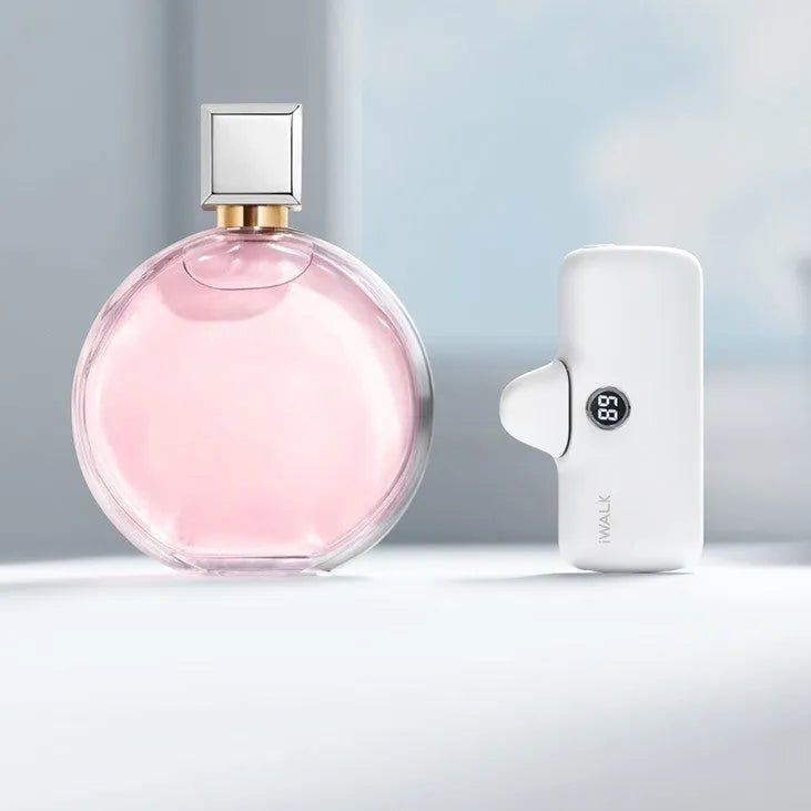 Compact lipstick-shaped portable power bank in multiple colours showing size and display screen