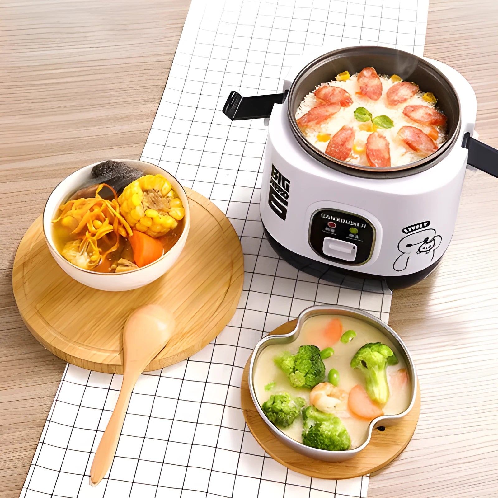 Compact round automatic rice cooker with mechanical controls, non-stick liner, and steam pan for 1-2 people