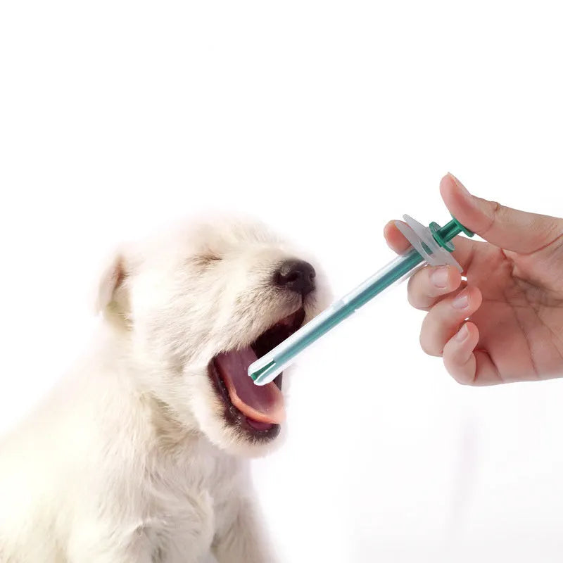 Two pet pill shooters with soft silicone tips for cat and dog tablet administration