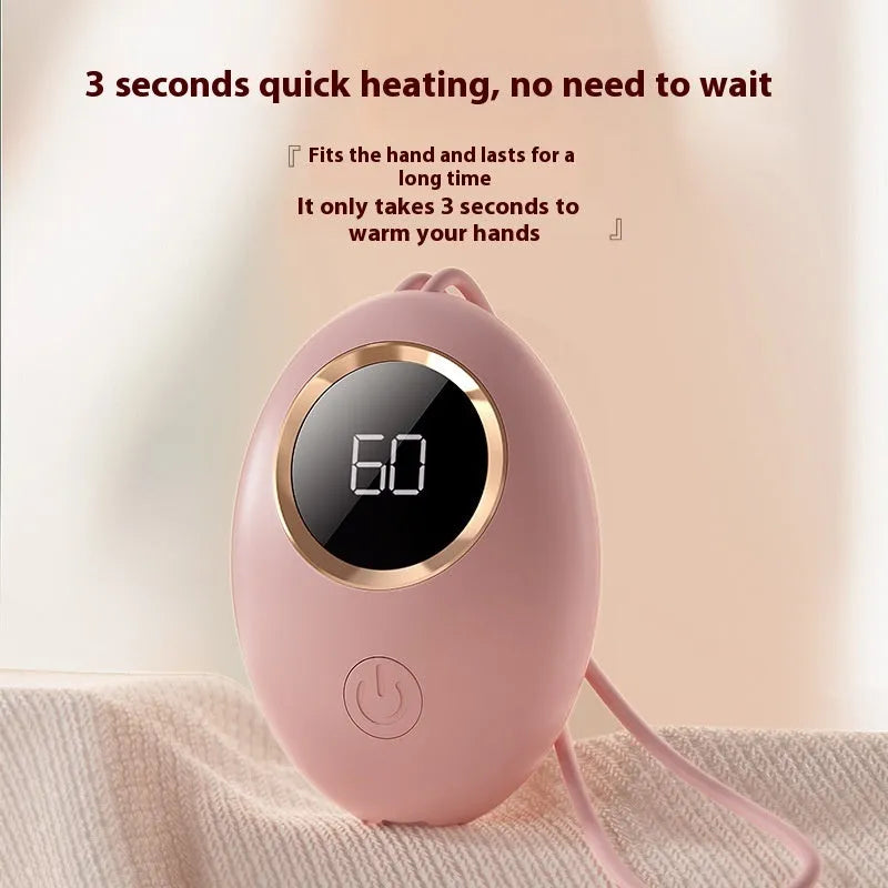 USB digital display hand warmer power bank in pink, showing aluminium heat dissipation design.