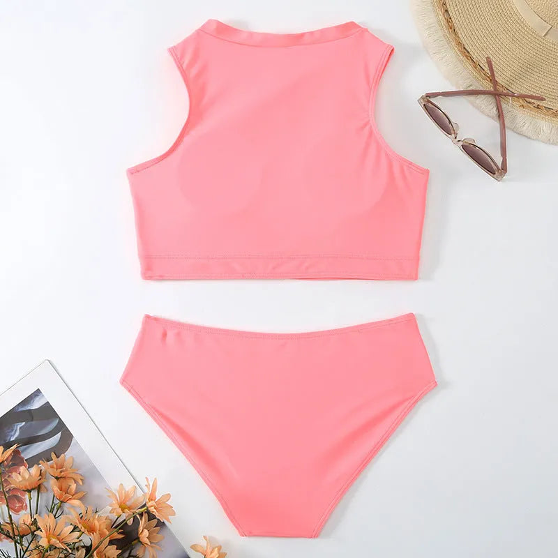 Solid pink women's high waist split bikini swimsuit set on a white background.