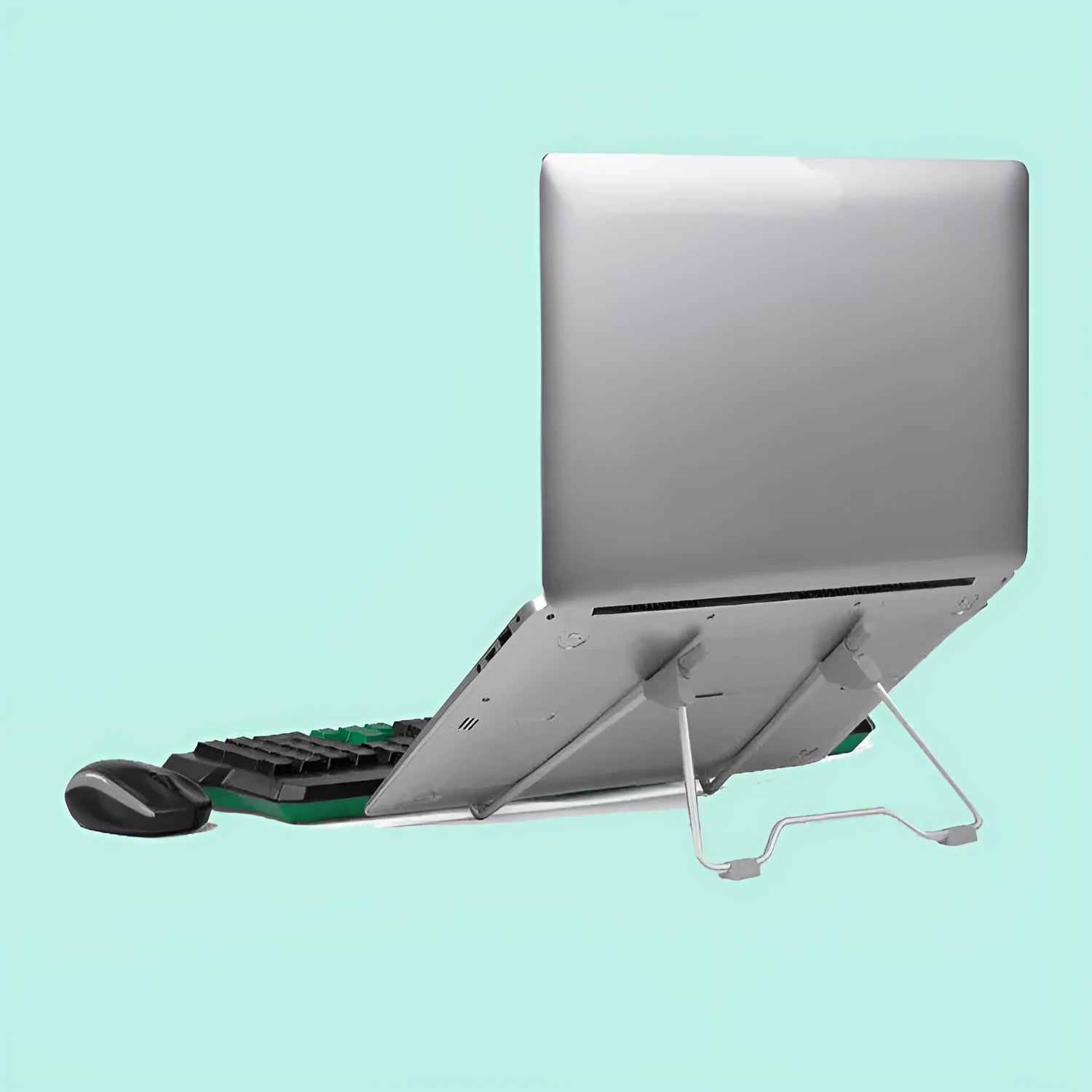 Grey aluminium alloy and engineering plastic stand holding a mobile phone and a laptop on a desk.
