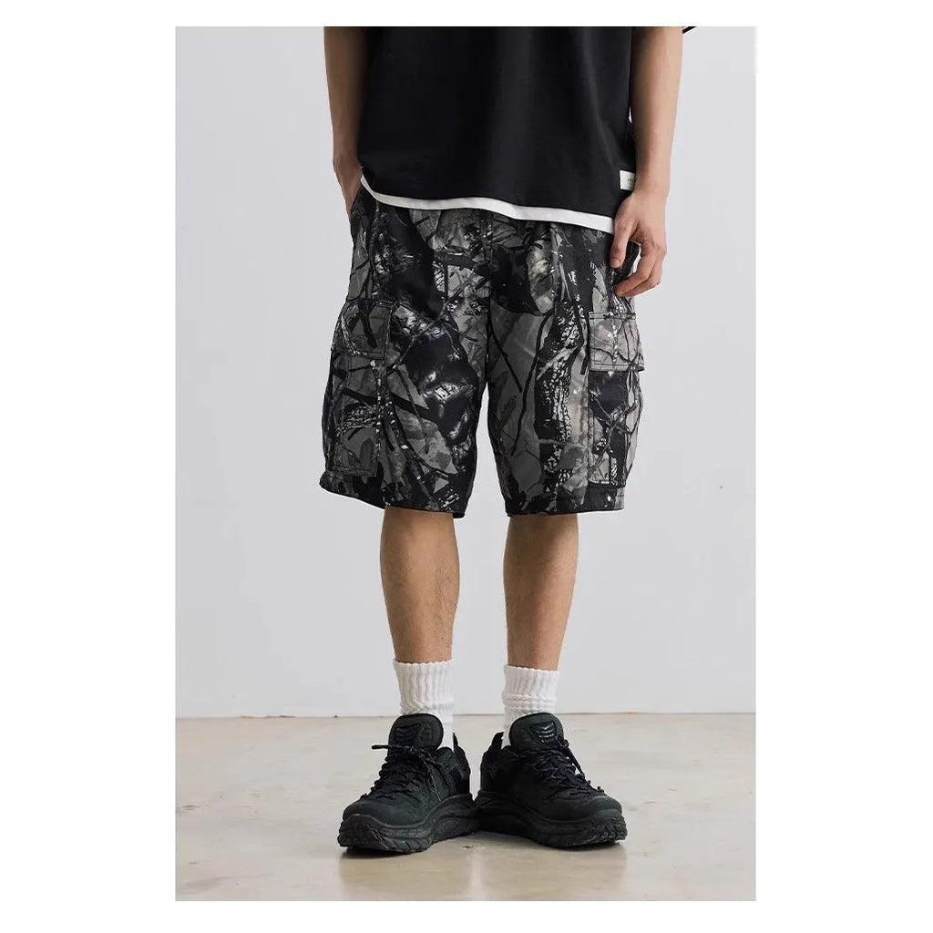 Loose casual straight-leg denim shorts in black colour with mid-waist design and zip fly placket
