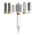 White and dark blue electric hot air styling comb with multiple attachments in leather case
