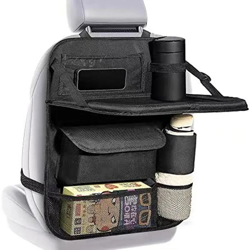 Black Oxford cloth car seat back storage bag hanging on vehicle seat