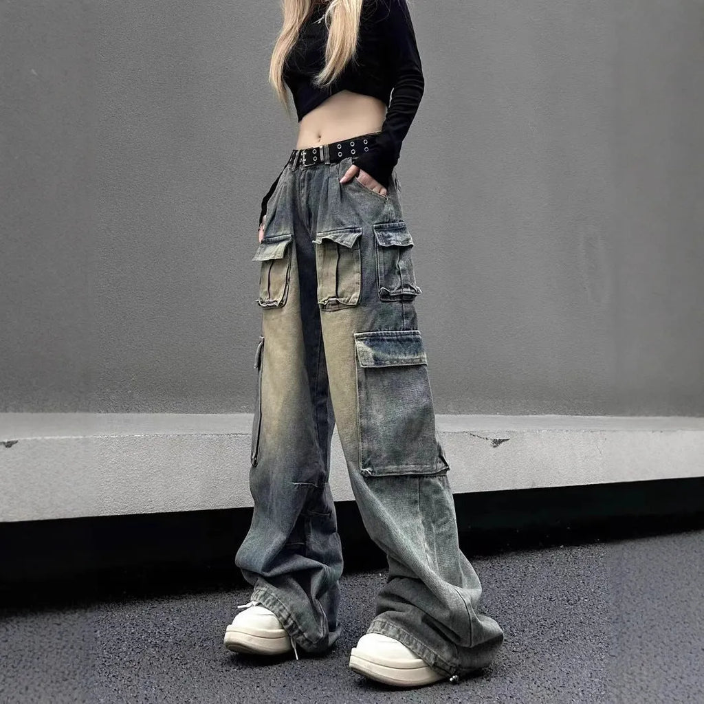 Light blue loose fit multi-pocket distressed jeans with straight leg cut and tooling style design