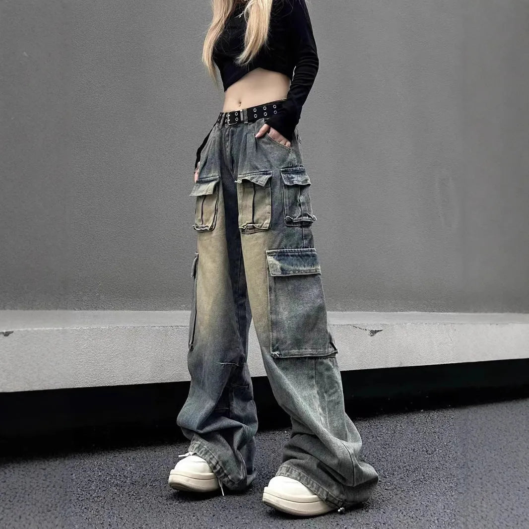 Light blue loose fit multi-pocket distressed jeans with straight leg cut and tooling style design