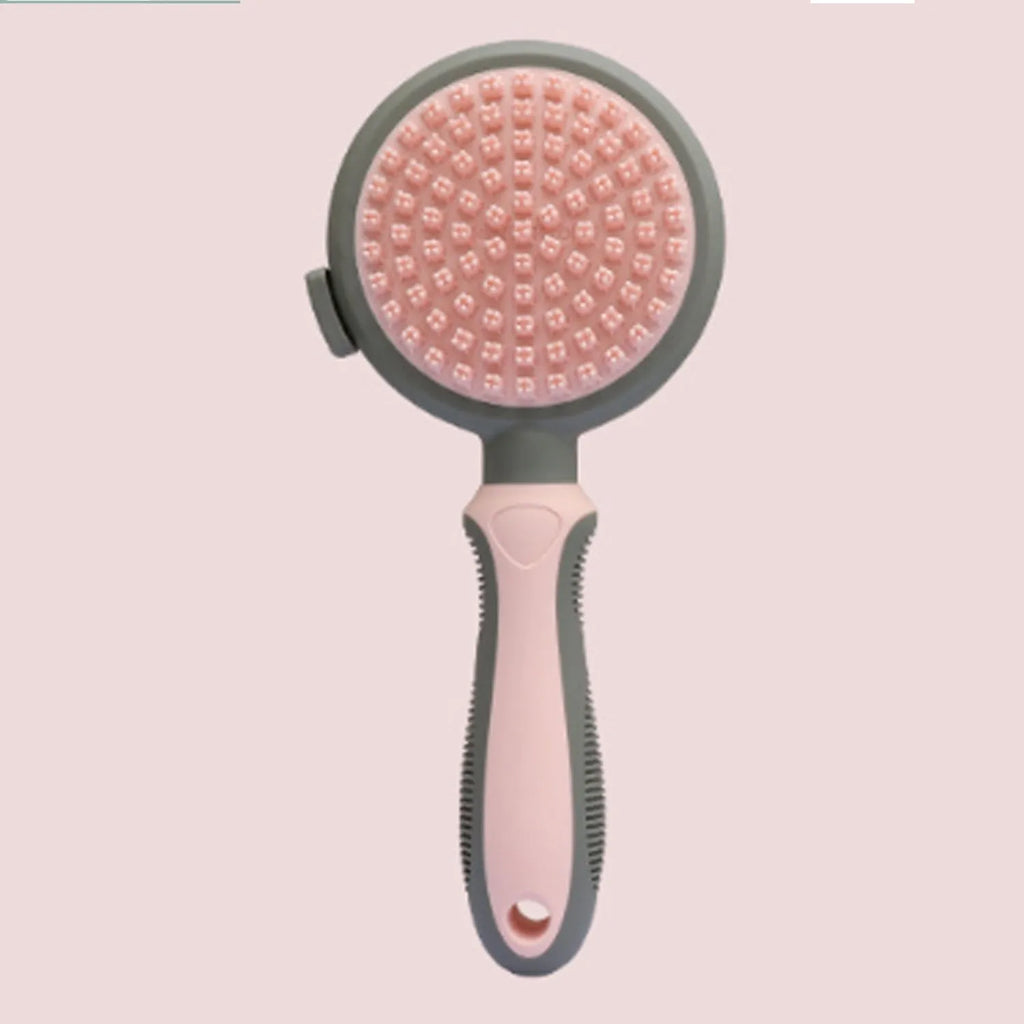 Double-sided pink cat brush with release button and separate flea comb for pet grooming