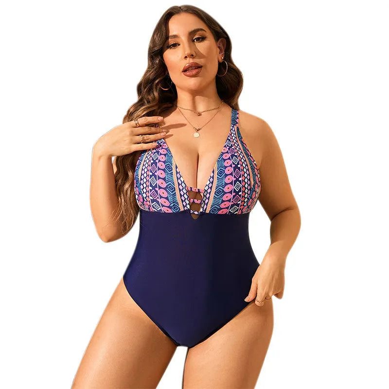 Plus size women's one-piece swimsuit with leopard print, V-neck, and sleeveless design.