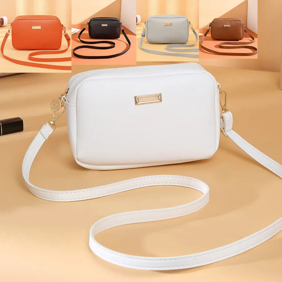 Women's solid colour PU shoulder bag with three-dimensional pockets and square suitcase shape