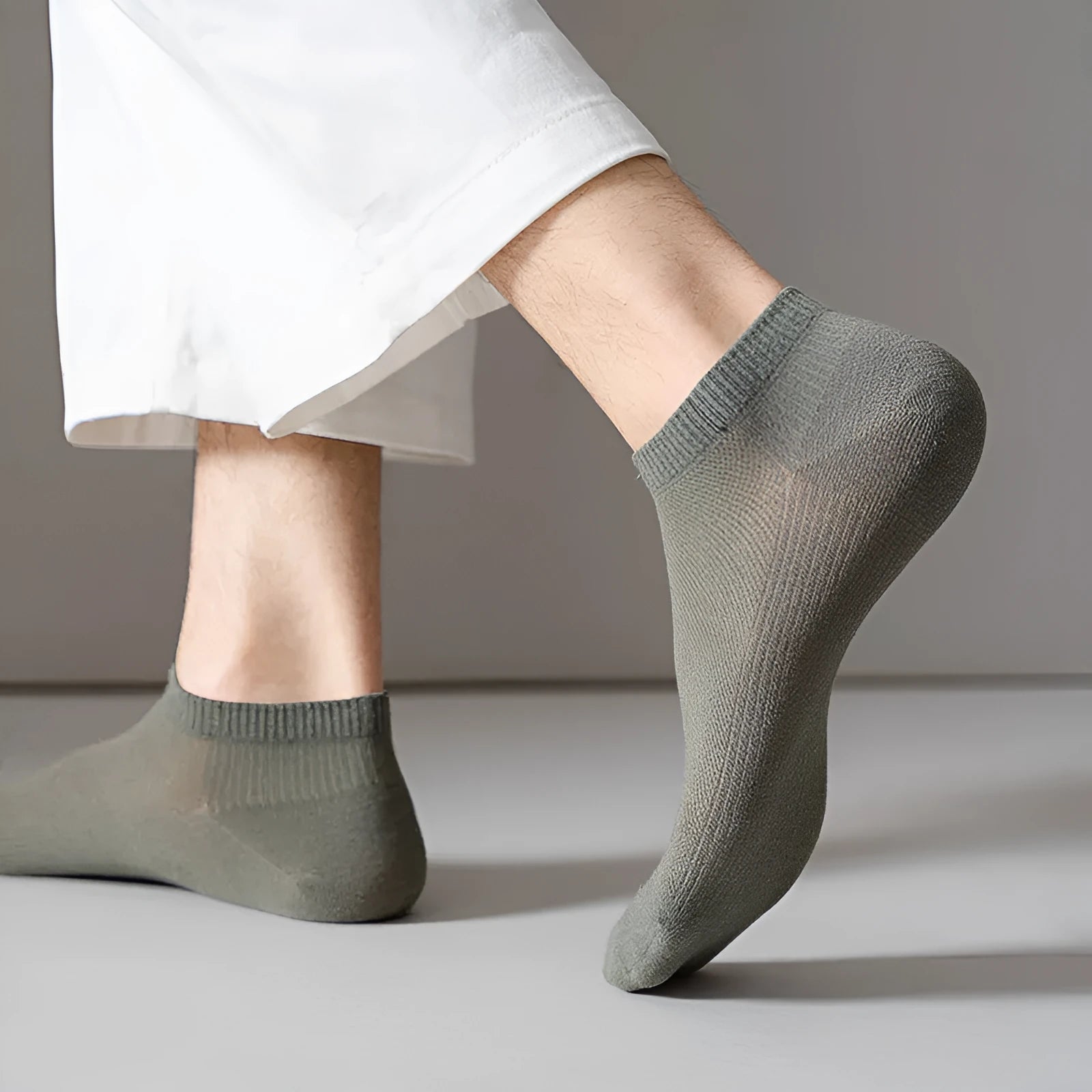 Men's solid colour polyester boat socks showing low-cut ankle design in various colour options