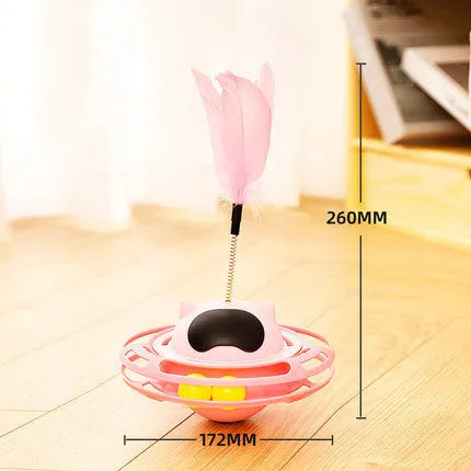 Pink plastic cat tumbler turntable toy with colourful balls measuring 17x10cm