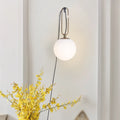 Modern clear glass wall lamp with dimmable LED light in three colour temperatures