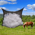 Woven grid horse feeding bag made from PE rope in black colour showing hanging design