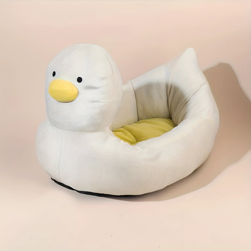 Duck-shaped fluffy pet bed for small dogs and cats in blue or white