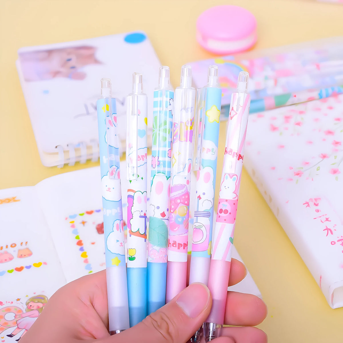 Six cartoon bunny design pens with 0.5mm black ink in plastic barrels