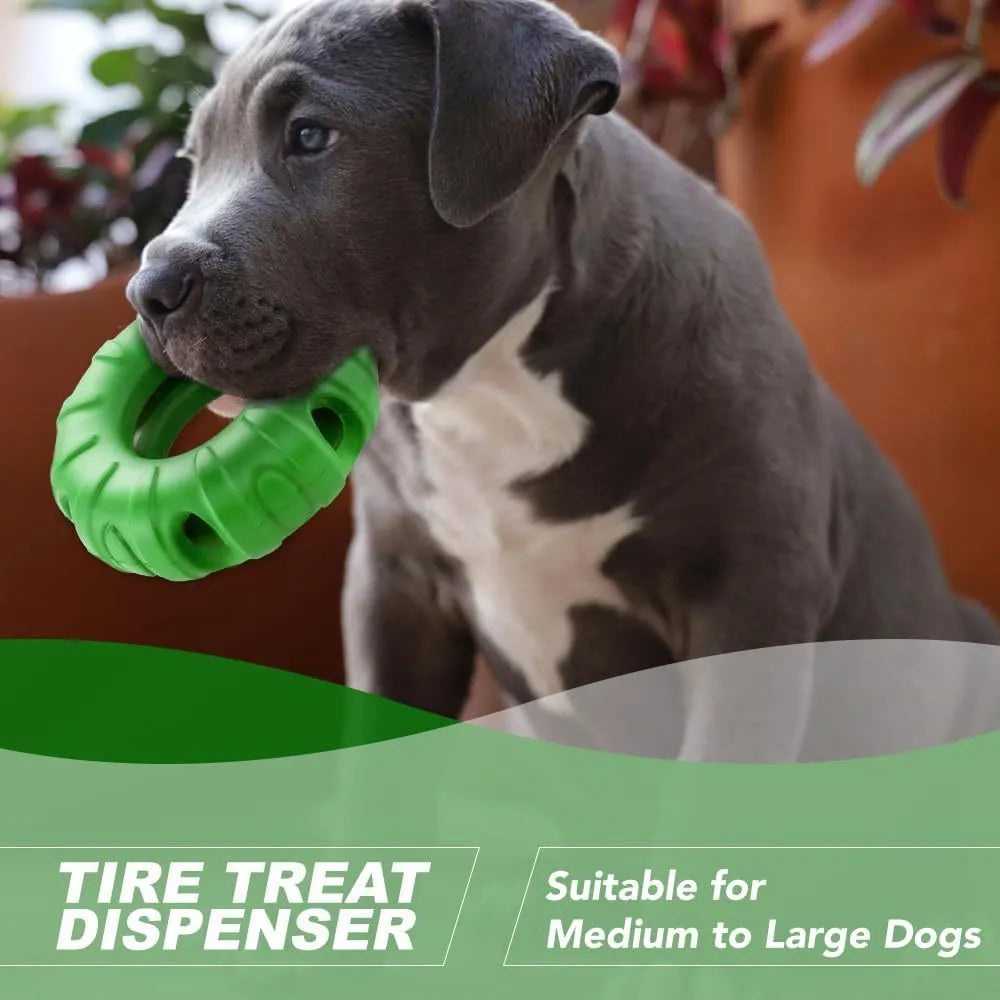 Blue natural rubber tyre-shaped dog chew toy with oval openings for treat dispensing.