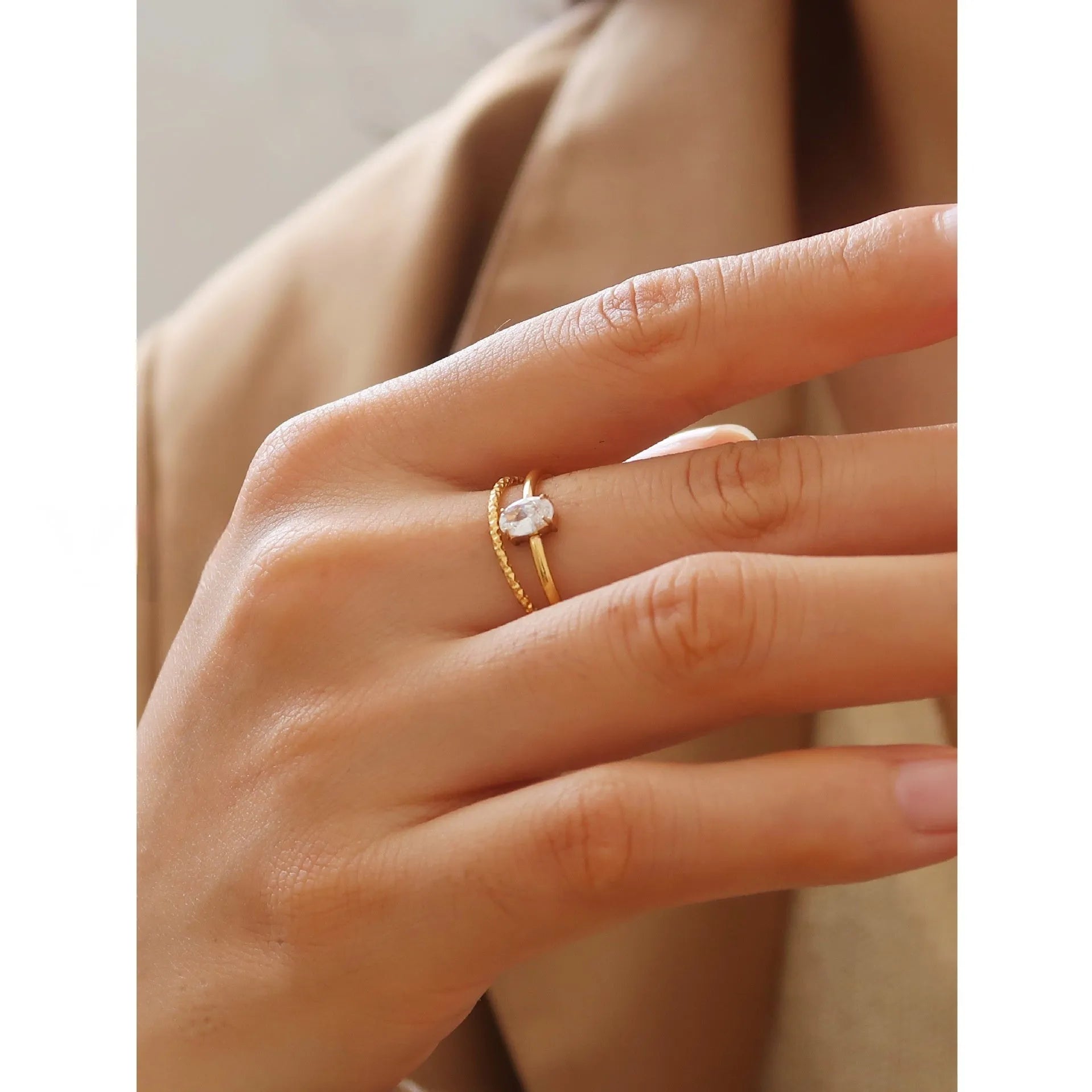 Golden electroplated stainless steel ring in heart or oval shape available in sizes 5 to 8