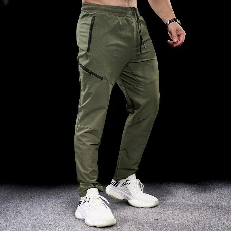 Men's Army Green waterproof quick-drying nylon workout pants, trousers length with mid waist.