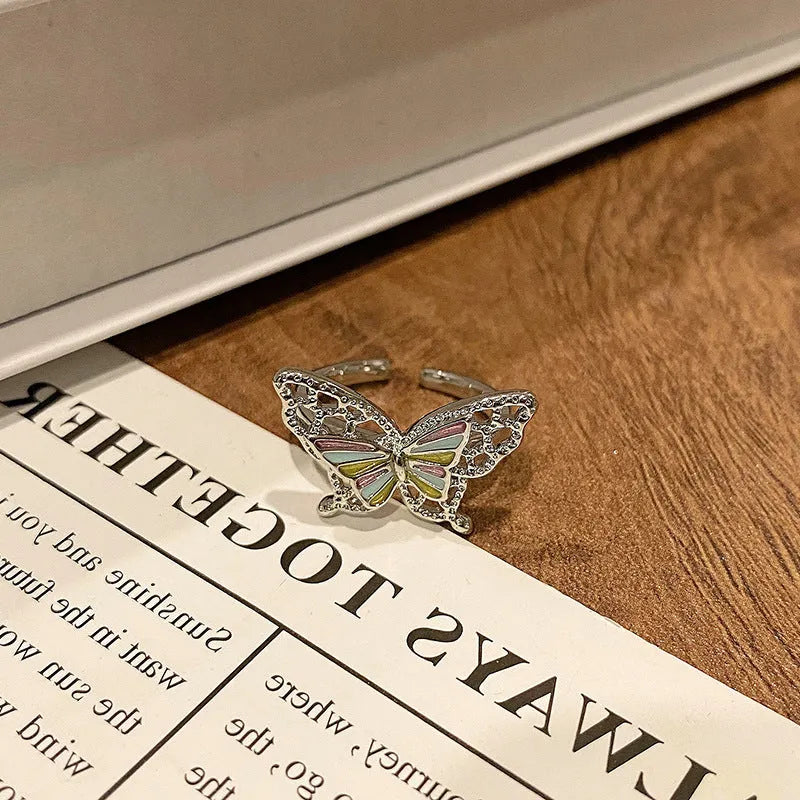 Butterfly women's copper ring with adjustable split ring design showing oil-drip colour treatment