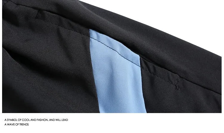 Men's black quick-drying sports shorts with elastic waist and straight-leg loose fit