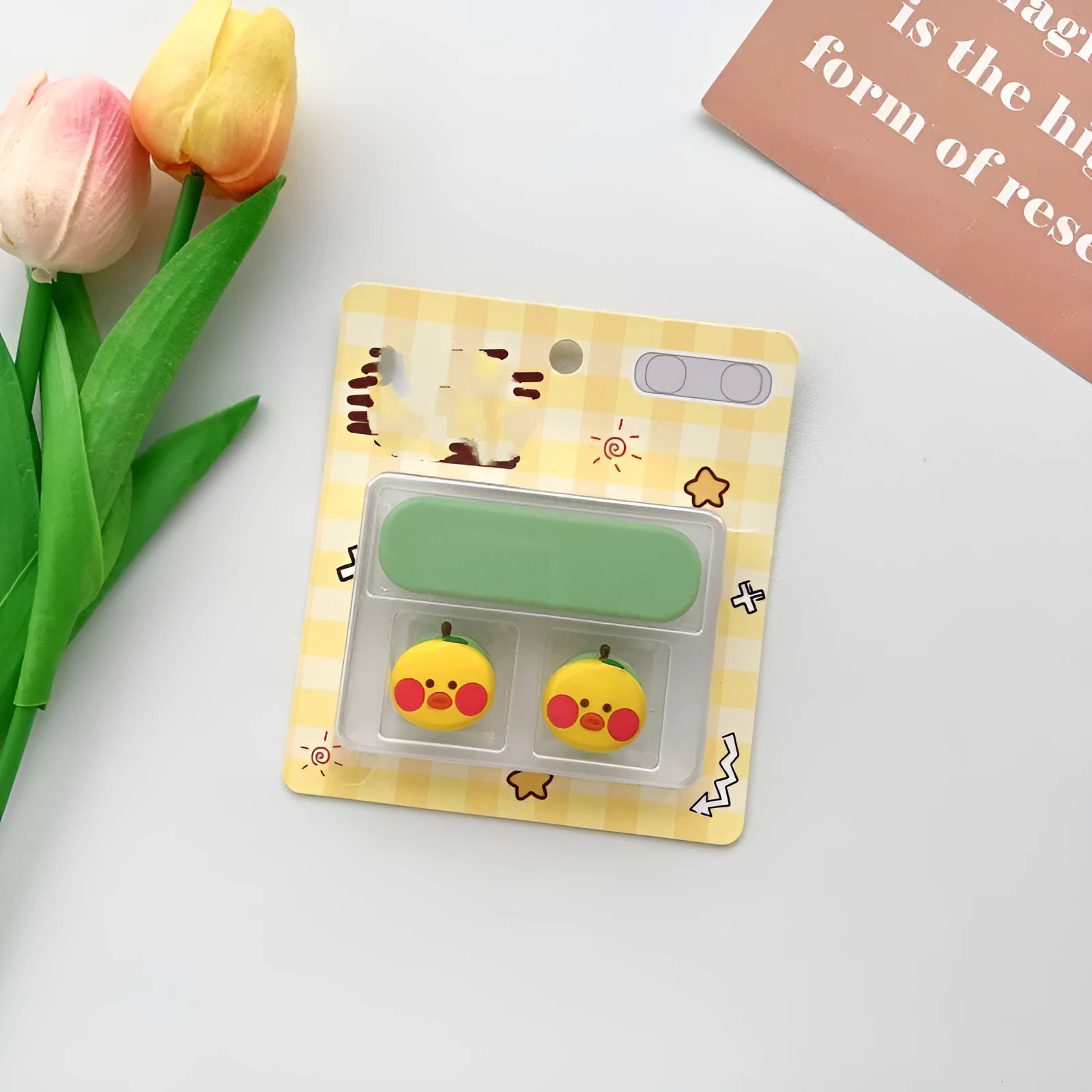 Cartoon style plastic cable fixer for organising desktop magnetic hub cables