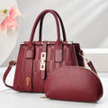 Round women's PU leather handbag in black showing crossbody and shoulder carrying options