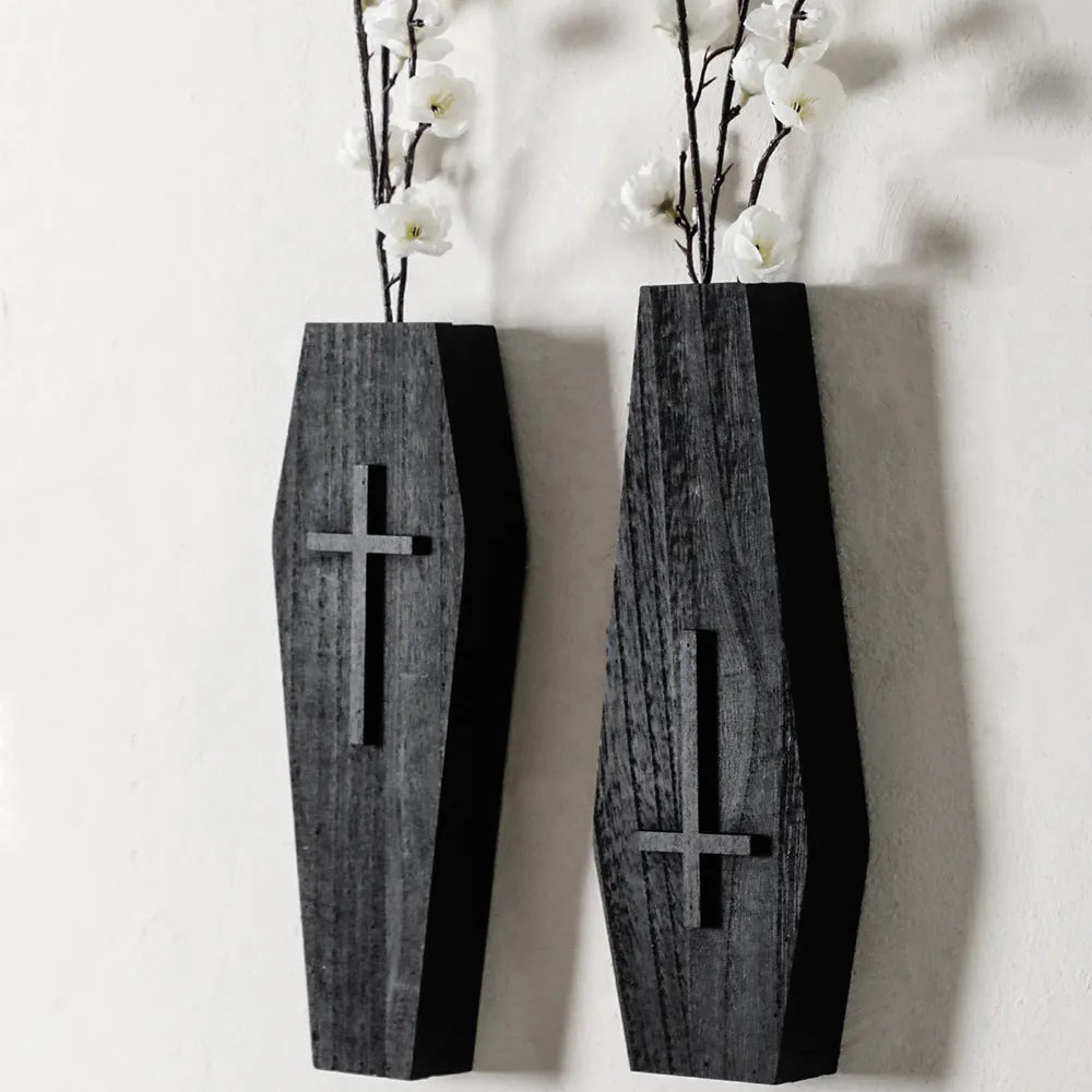 Wooden cross-shaped wall shelf with display area measuring 27 by 9 centimetres