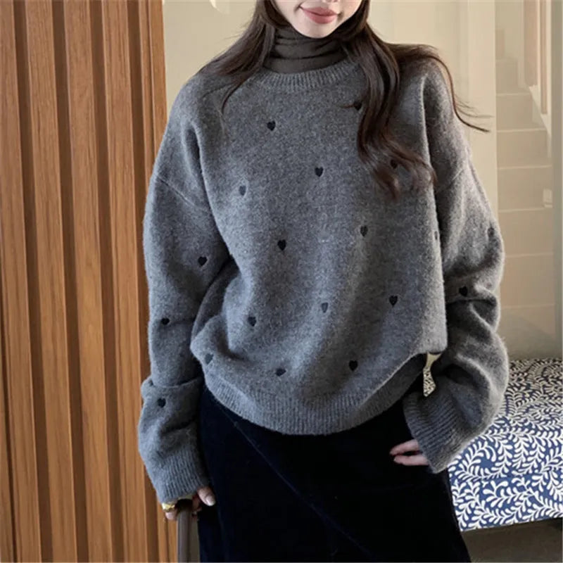 Women's loose-fitting acrylic pullover sweater with love embroidery in milky white, long sleeves, crew neck.