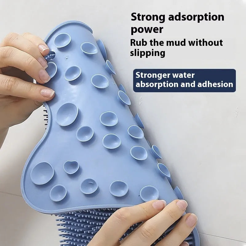 Silicone bath massage cushion mat measuring 31x32cm in blue colour with textured surface for foot scrubbing