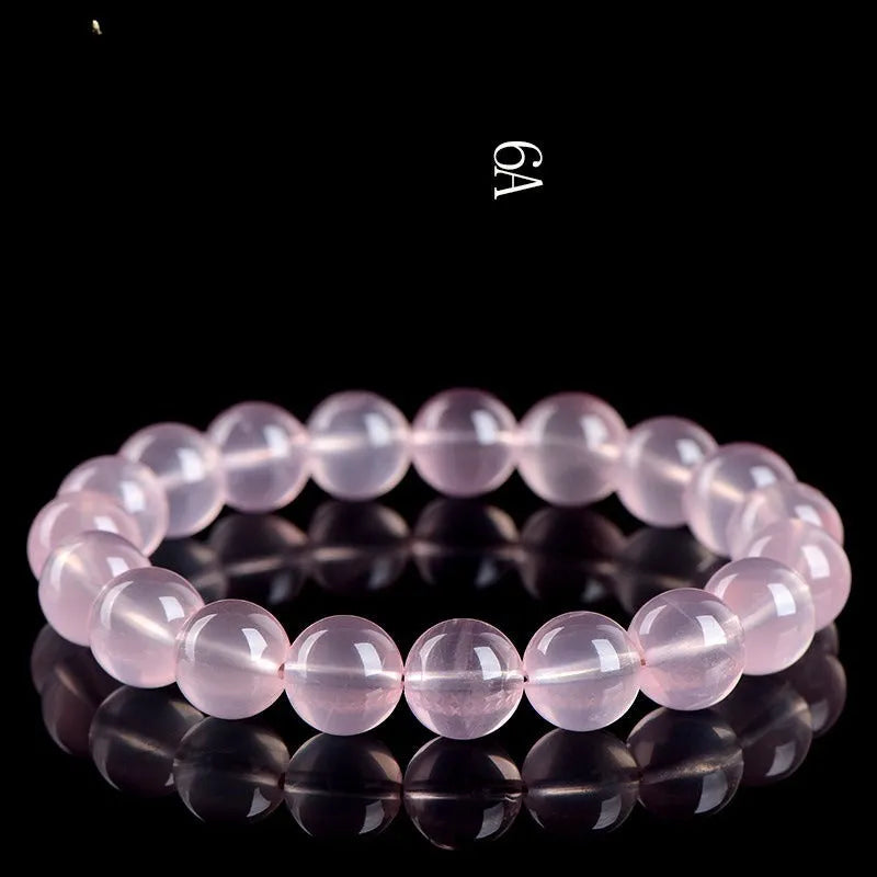Natural starlight crystal round bead bracelet in pink with polished finish