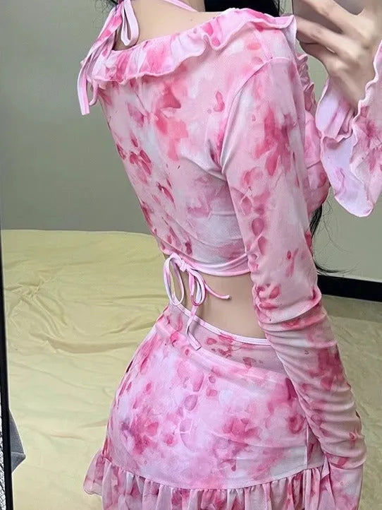 Women's cherry blossom pink floral bikini swimsuit on mannequin