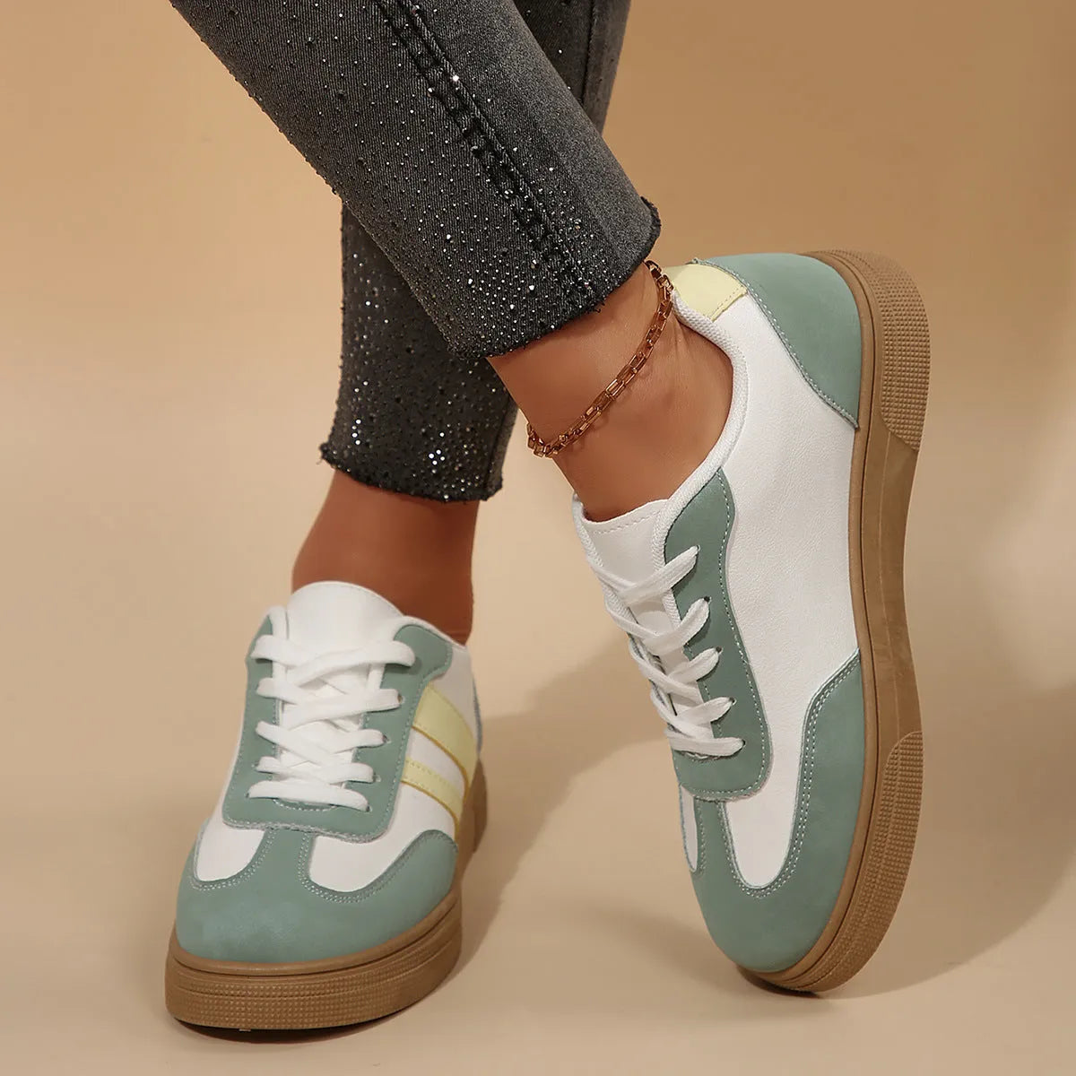 Green retro sports women's pumps with cross-strap design and round toe