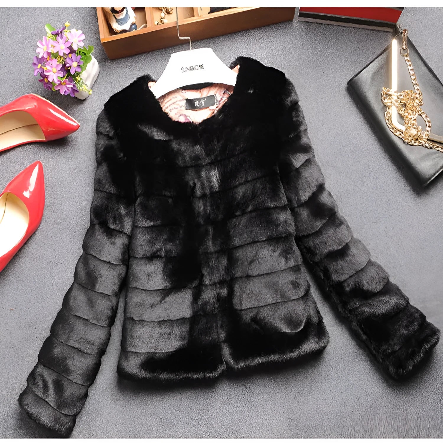 Women's short faux fur top in beige, shown with regular sleeves, for street fashion wear.