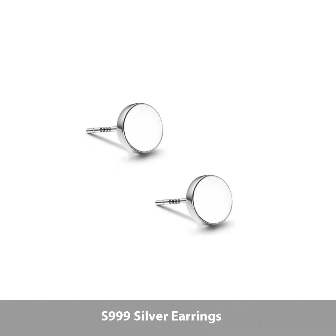 A pair of simple round sterling silver S999 stud earrings on a flat surface, shown in silver and black finishes.