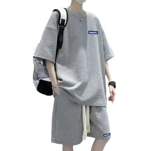 Waffle-textured leisure sports suit set with short sleeve top and shorts in cotton polyester fabric
