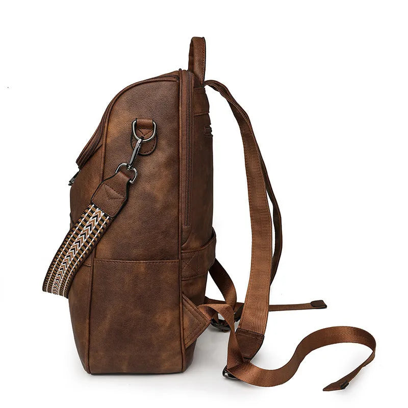 Retro college student backpack in PU leather with curved shoulder straps and solid colour options