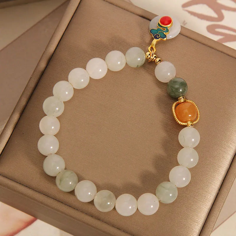 Ice jade women's bracelet with pearl accents and Xiangyun peace jade buckle design