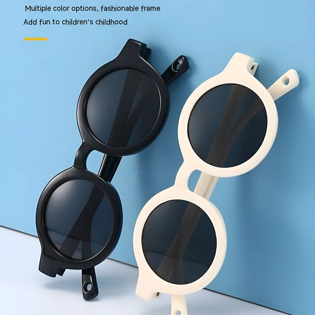 Soft silicone round-frame sunglasses for babies and toddlers aged 0-3 years with polarised UV400 lenses.