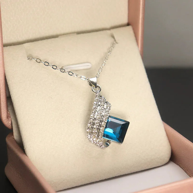 Women's electroplated necklace and earring set with alloy pendant and glass accents