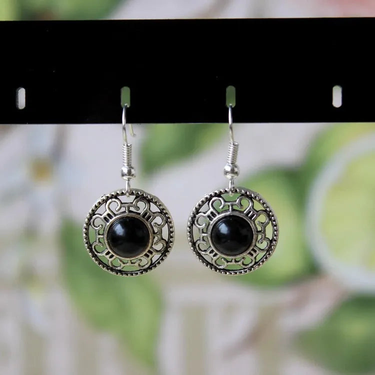 Ethnic Miao silver earrings with turquoise flower disk and geometric auspicious patterns